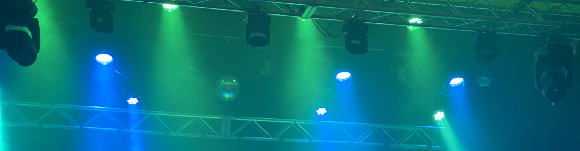 blue and green theater stage lights Fayetteville